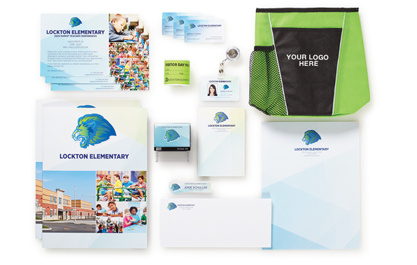 collection of school-branded merchandise, including letterhead, bags, etc.